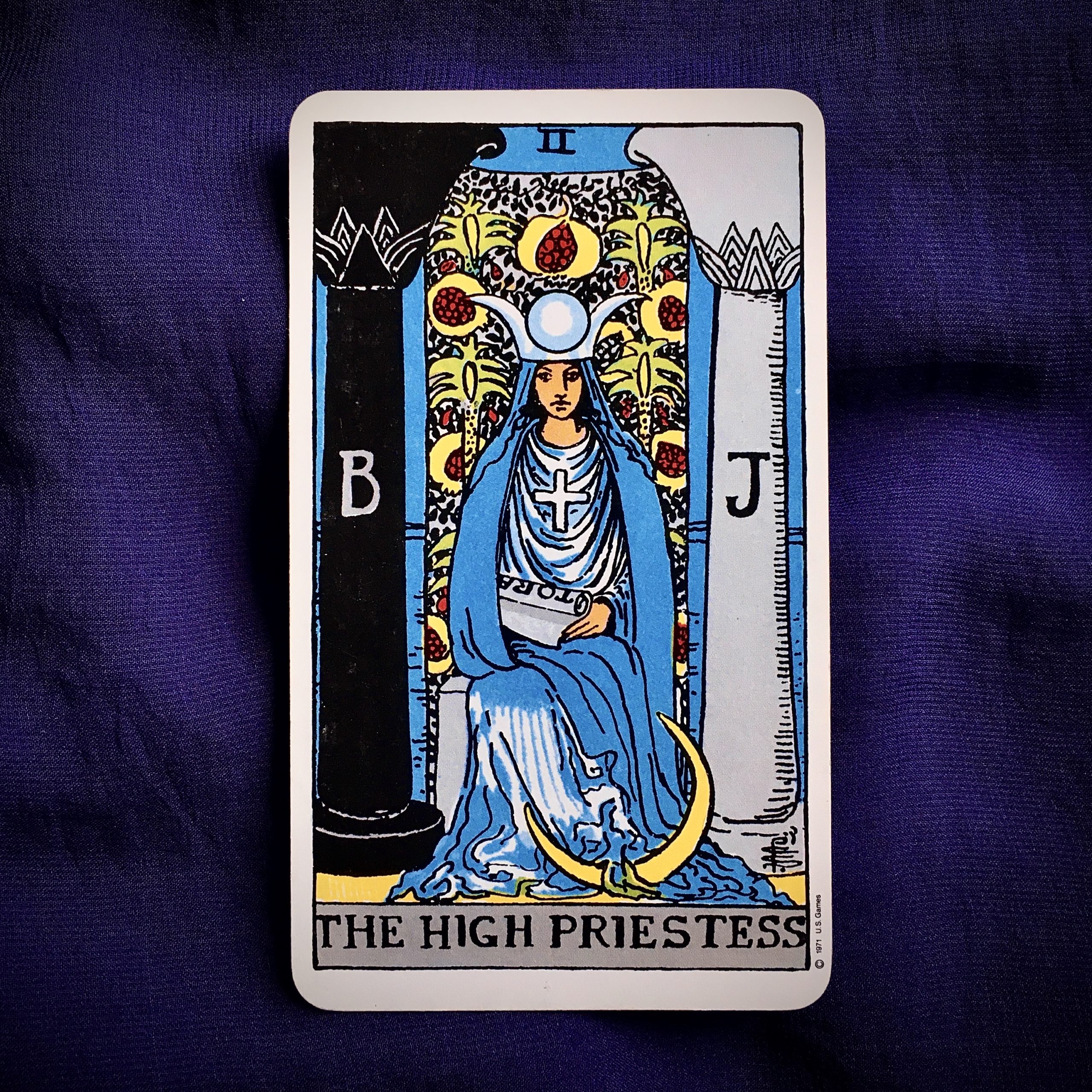 the High Priestess, Rider-Waite-Smith tarot, on royal blue background